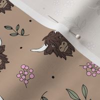 Adorable Scottish highland cows - cute cow faces daisies and grass leaves berries wild animals and botanical leaves winter fall design  kids pink olive green on beige tan