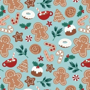 Christmas snacks collection - cutesy gingerbread cookies hot chocolate candy cane and pine branches christmas pudding donuts kids design ruby red emerald green on aqua blue