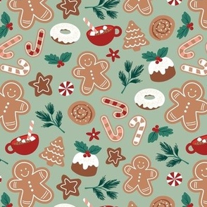 Christmas snacks collection - cutesy gingerbread cookies hot chocolate candy cane and pine branches christmas pudding donuts kids design ruby red emerald green on sage