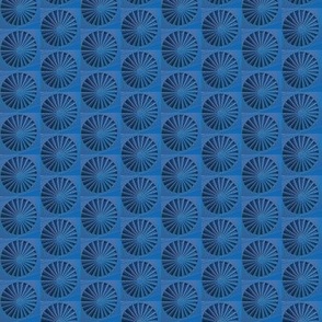 Spinning Spots of Blue