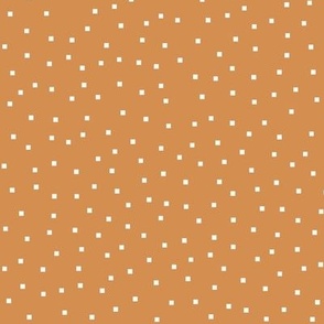 square dots on caramel