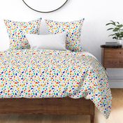 Bright abstract pattern with cut out shapes in red, blue, yellow, green and pink colours