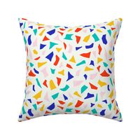 Bright abstract pattern with cut out shapes in red, blue, yellow, green and pink colours