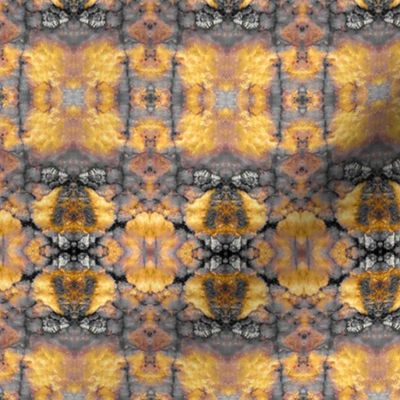 Mirrored quartz geological rocks kaleidoscope of colours Yellow and grey hues