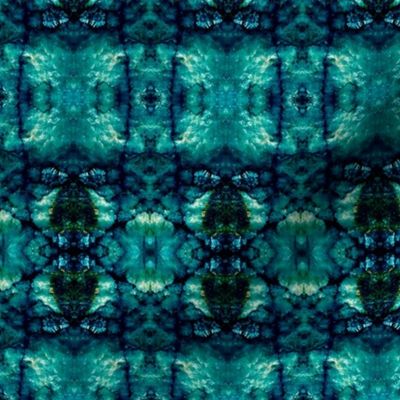 Mirrored quartz geological rocks kaleidoscope of colours turquoise and indigo blues