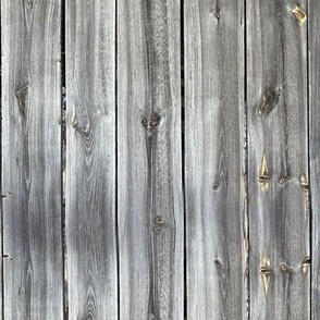 Old wooden planks. Small scale. Vertical. Old wood. Dark wood planks. 