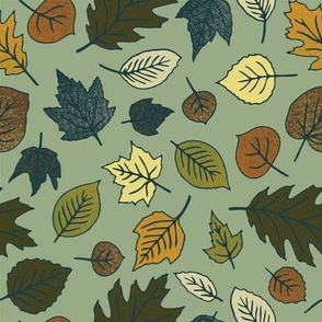 Scattered Fall Leaves on a Green Background • Medium Scale