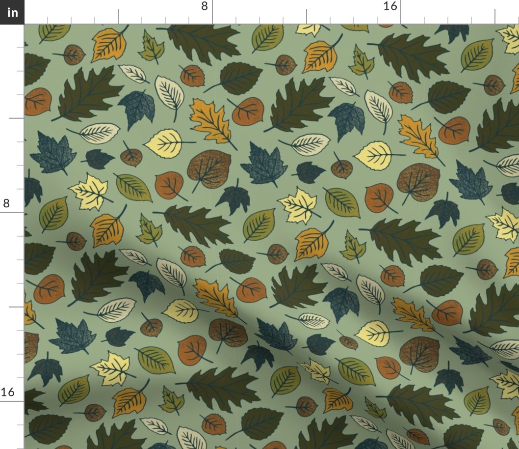 Scattered Fall Leaves on a Green Background • Medium Scale