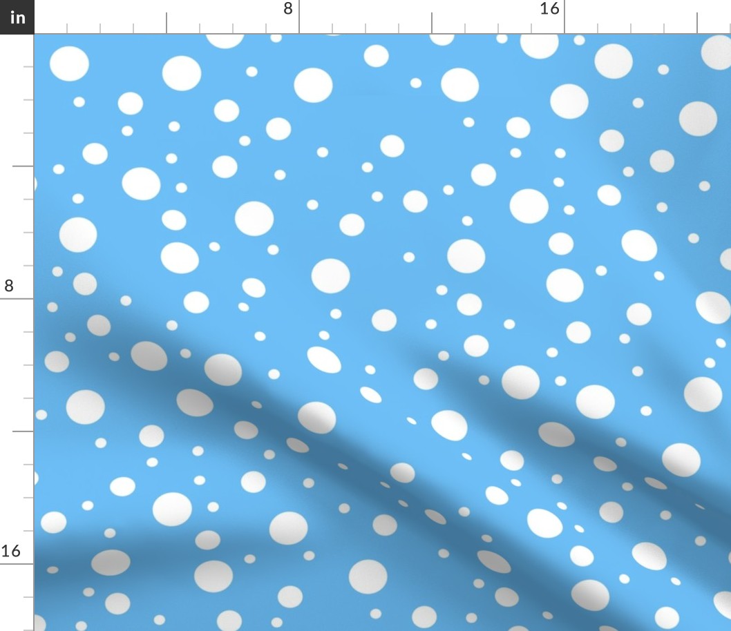 varying polkadots white on light blue