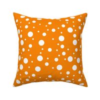 varying polkadots white on orange