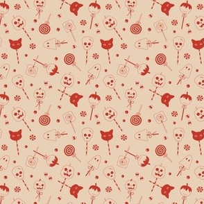 Halloween sweets and candy - ghosts cats zombies and pumpkins for fright night cutesy kawaii style lollipop vintage red on beige sand SMALL