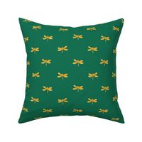 gold dragonfly on green 