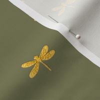gold dragonfly on sage 