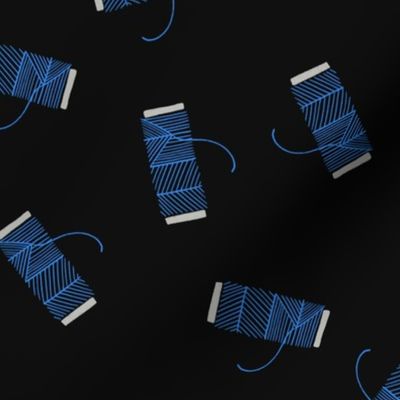 Sewing Hobbie | Ditsy Blue Thread Spools with Dark Background