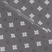 (S) morocco flower tiles in white and black on dark grey
