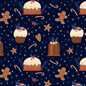 Christmas pudding and cookies on dark blue. Christmas gingerbread cookie.