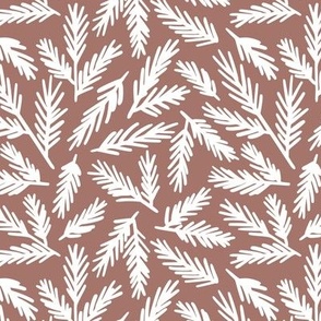 Hand-drawn pine leaves on maroon background 