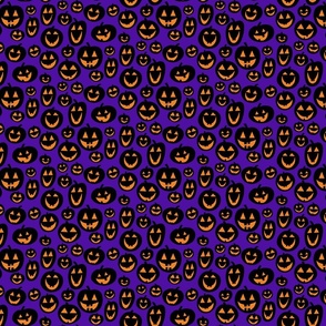 Cheerful Pumpkins Smiling on an Eggplant Purple Background