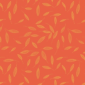 small scattered tropical colourful leaves in yellow and bright orange
