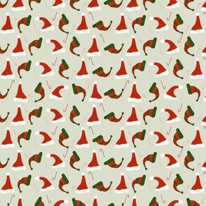 Santa and elf hats with candy canes on soft green // 10”