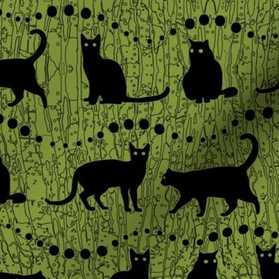 Black Cats on Green Background   