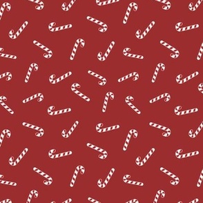 Christmas candy canes on red small