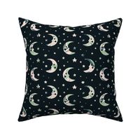 Boho style moon and stars with green marble texture on a black background 