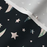 Boho style moon and stars with green marble texture on a black background 