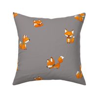 Large scale-cute baby fox on gray background