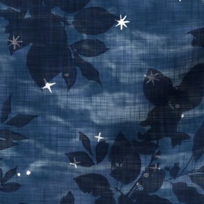 Woodland Stars in Indigo Blue (large scale) | Night sky with block print stars, trees, leaves on shibori linen texture, temperate forest canopy, deciduous trees, look up, crown shyness, camping fabric, block printed stars on dark blue.