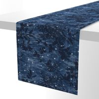Woodland Stars in Indigo Blue | Night sky with block print stars, trees, leaves on shibori linen texture, temperate forest canopy, deciduous trees, look up, crown shyness, camping fabric, block printed stars on dark blue.