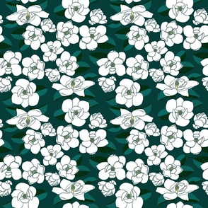 small  - white magnolia blooms on emerald green