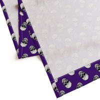 Skulls Skulls Skulls on purple. 