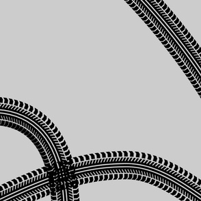 tire tracks swerve on light gray