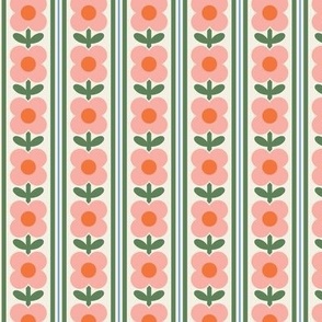 Pink flowers with red centers in vertical stripe with blue and green