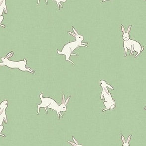 Leaping white bunny rabbits on mint with linen texture