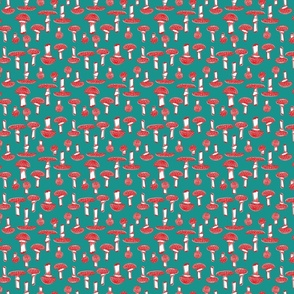 small - red mushrooms on teal