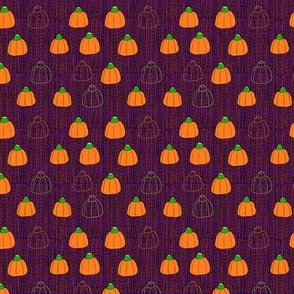 Candy pumpkins in a row on Purple-ish plaid Patchwork 6”