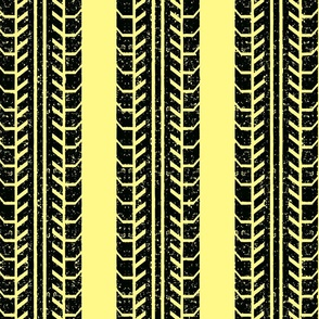 worn tire stripe on pastel yellow
