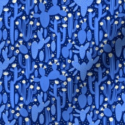 Pattern with cactus. Blue and white colors on black.