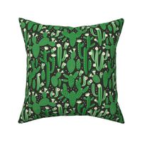 Pattern with cactus. Green and white colors on black.