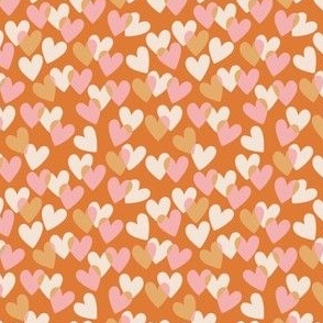 Valentine love hearts in pink, cream and tan on rust orange - MEDIUM SCALE