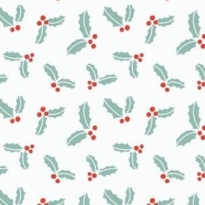 Christmas holly leaves and berries in red and green on cream