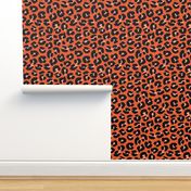 The fat leopard - Halloween cheetah spots wild animal print for fall and pumpkin season black blush on orange