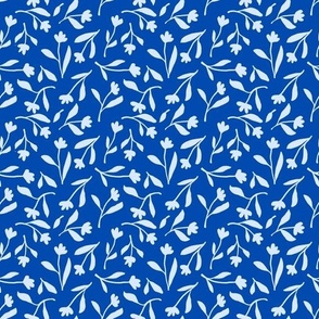 Tossed white flower silhouettes on royal blue background