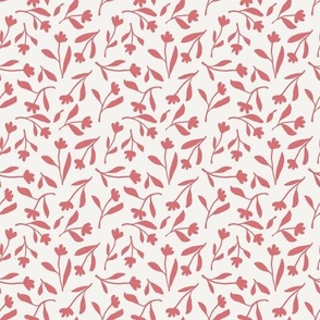 Tossed brick red flower silhouettes on cream background