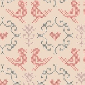 Love birds in traditional folksy cross stitch, faded red, teal and mauve on pastel apricot beige