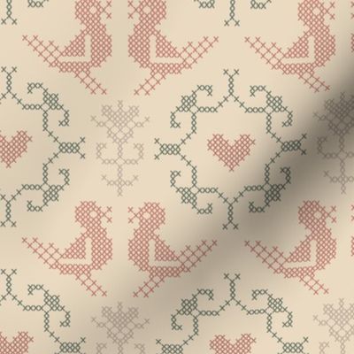Love birds in traditional folksy cross stitch, faded antique pink, olive green and sand on warm beige 