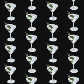 Classic Martini with Olives on a Black Background. 