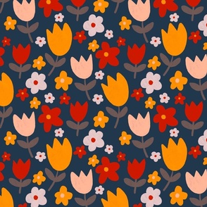 Red, pink and yellow tulip flowers on navy 